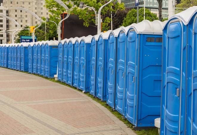 a row of portable restrooms at a trade show, catering to visitors with a professional and comfortable experience in Cathedral City